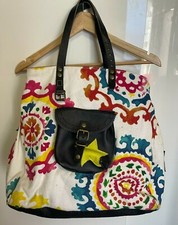 Sac a mains Pomponette en tissus et cuires