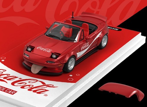 Mazda with hardtop coca - /,