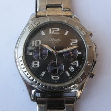 3403* montre homme quartz  ushuaia 10 ATM  ancienne