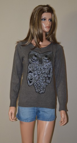 Pull beige foncé motif