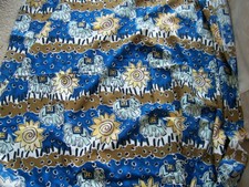  COUPON DE TISSU ELEPHANT SOLEIL MOTIFS VIFS TONS BLEUS -TM 4/1