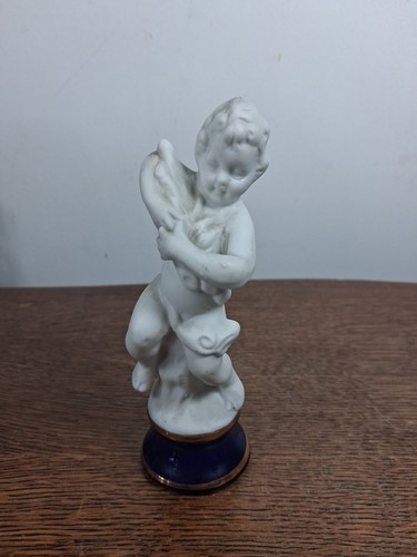 Statuette angelot biscuit - en,