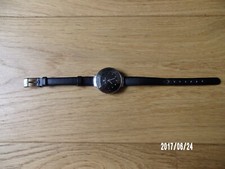 Montre Ted Lapidus, noire,  neuve sans étiquette.