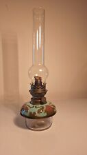 Ancienne lampe à pétrole façon barbotine verre