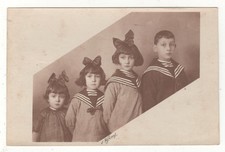 CARTE-PHOTO - PHOTO DE QUATRE ENFANTS - Frères et soeurs - ÉCRITE LE 27-02-1922