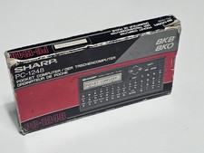 sharp pc 1248 s'allume, les touches sont ok calculatrice calculator