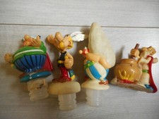lot de 4 figurines publicitaires astérix - sirop ? - smarties ?