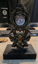 STATUETTE PORTE MONTRE A