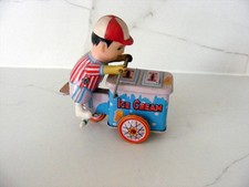 Jouets à remonter marchand de glace ICE CREAM en très bon état avec sa clef.