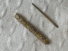 Porte aiguille et son aiguille en argent massif vermeillé