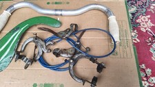 Vélo ancien lot pièces détachées guidon allu étriers drior leviers carter chaîne
