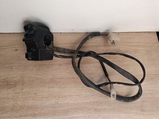 UN COMMODO COMMANDE GAUCHE