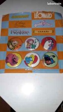 6 badges theme BD le lombard