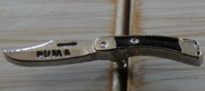 BEAU PETIT PIN'S COUTEAU PUMA