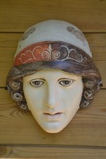 Ancien masque mural visage
