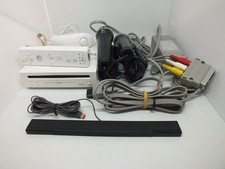 console nintendo wii + 1 manette wii motion plus, accessoires et 1 jeu.