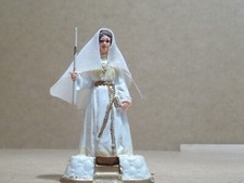 Figurine de communiant avec son cierge