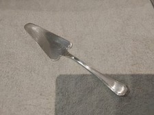 pelle à tarte métal argenté