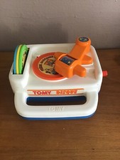 VINTAGE  JOUET TOMY TOURNE