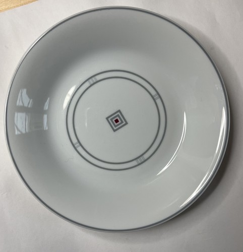 Une assiette creuse marque - ,