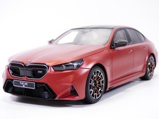 BMW M5 orange Peable beach