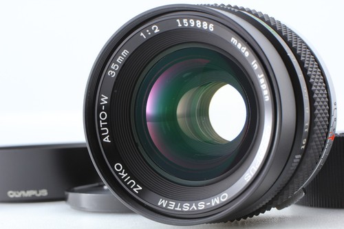 Objectif grand angle tardif