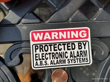 small sticker WARNING