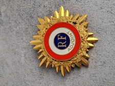 BROCHE SOLEIL EN BRONZE D'ADJOINT DE 4 CM DE DIAMETRE