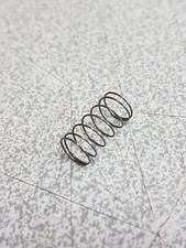 Ressort bouton commande interrupteur  Four Whirlpool AKZ 122/MR/01  FXTM6