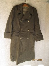 Ancienne capote militaire de la Coloniale WW 2 , insigne , tampons