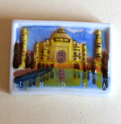 Fève cartes postales monde - du,