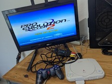 Console Ps One en boîte avec