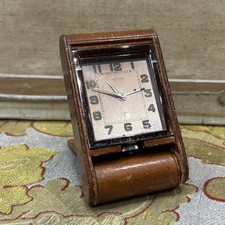 ancien reveil de voyage jaeger lecoutre  pendule CUIR