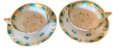 Deux tasses et sous tasse en