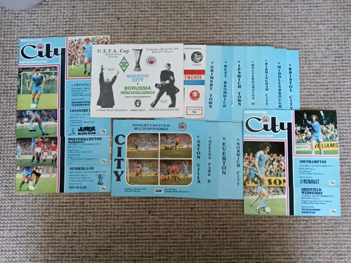 Man city programmes - 19,
