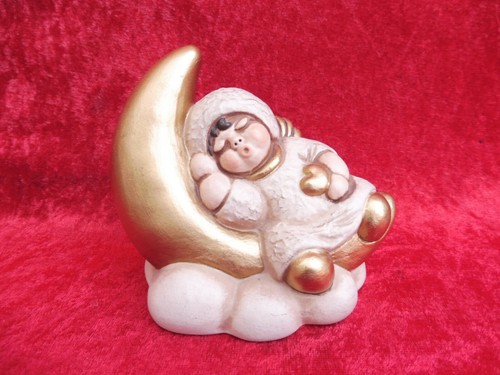 Belle figurine céramique - en,