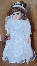 Poupée en Porcelaine -