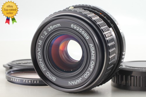 Comme neuf objectif grand - ],