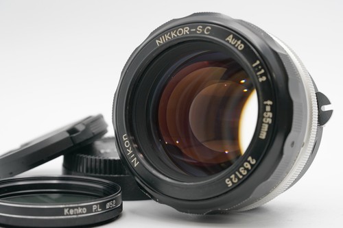 Near mint objectif nikon - mint,