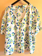 SURKANA  chemise manches courtes  taille L ou 40