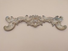 Fronton bronze ornements