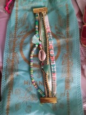 Bracelet HIPANEMA bon état, ton vert, 19 cm avec pochette de rangement. 