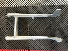 Honda C 100, C110, Bras oscillant