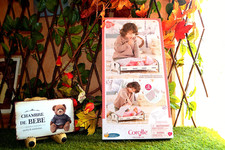 lit en  bois corolle pour