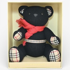 Authentique poupée peluche