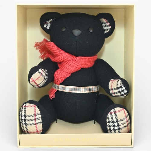 Authentique poupée peluche