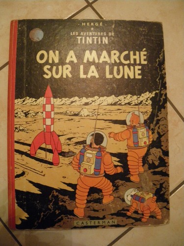 Tintin marche sur - tintin,