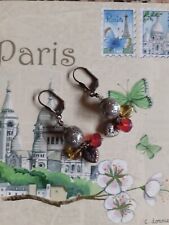 Belles et anciennes boucles d'oreilles dormeuses "Love Elixir" de Satellite