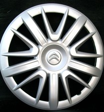 ENJOLIVEUR DE ROUE POUR