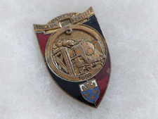 Un insigne militaire  " 5°